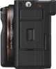 Side view of a black digital camera. Produktbild-Vorschau