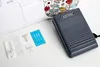 A sewing machine and its accessories are laid out on a white surface. Produktbild-Vorschau