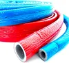 Several rolls of insulated tubing in red and blue colors. Produktbild-Vorschau