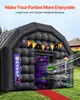 An inflatable party tent decorated for Halloween, set up outdoors on a lawn. Anteprima dell’immagine prodotto