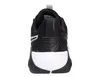 The back view of a black and white Puma sneaker. Produktbild-Vorschau
