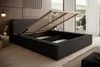 A modern bedroom with a large bed with its storage compartment open, showcasing the slatted base and hydraulic lifts. The room has wooden wall paneling and large windows with sheer curtains. Voir les images du produit