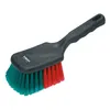 A cleaning brush with a black handle and teal and red bristles, isolated on a white background. Produktbild-Vorschau