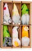 A set of six decorative gnomes in a cardboard box. Produktbild-Vorschau