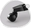 Close-up of a black gaming chair caster wheel and its mount. Anteprima dell’immagine prodotto