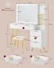 A white vanity table with gold legs and a stool, shown with dimensions and feature callouts. Produktbild-Vorschau