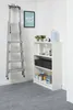 A corner of a room with a ladder, a bookshelf, and a framed picture on the wall. Produktbild-Vorschau