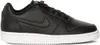 A black Nike shoe with a white sole is shown against a white background. Produktbild-Vorschau