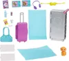 A collection of Barbie travel accessories laid out on a white background. Produktbild-Vorschau