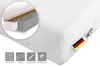 A close-up view of a mattress with an inset showing its internal layers and icons detailing its features. Produktbild-Vorschau
