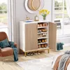 A shoe cabinet is shown in a room with a chair and a bed. Anteprima dell’immagine prodotto