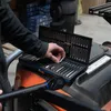 A person is holding a tool from a set of tools. Produktbild-Vorschau