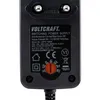 Close-up of the label on a black power adapter. Produktbild-Vorschau