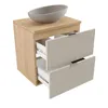 A bathroom vanity with a sink on top and two open drawers. Náhľad obrázku produktu
