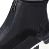 A close-up view of a black high-top sneaker. Produktbild-Vorschau