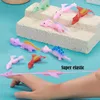 5er Set Dino Schleuder Spielzeug – Lustige, fliegende Produktbild-Vorschau 7