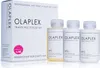 A white box and three bottles of Olaplex hair treatment products are displayed against a white background. Náhľad obrázku produktu