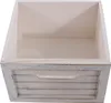 An empty, white wooden storage box with a slatted front and a cutout handle. Podgląd zdjęcia produktu