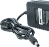 A black power adapter with a coiled cable and a connector plug. Produktbild-Vorschau