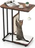 A cat is scratching a sisal board attached to a side table. The table has a wooden top with a magazine, coffee cup, and a small plant on it. A fluffy toy hangs from the table. Produktbild-Vorschau