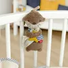 Fehn Mini boîte à musique 20 cm - Loutre Voir les images du produit 10
