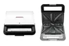 A white and black sandwich maker is shown with its lid open, revealing the cooking plates. Podgląd zdjęcia produktu
