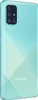 The back of a turquoise Samsung Galaxy A71 smartphone is shown in a studio setting. Podgląd zdjęcia produktu