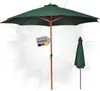 A green patio umbrella is shown open, with a smaller, closed umbrella to the right. A German flag badge with the text 'DEUTSCHE MARKE' is attached to the pole of the open umbrella. Produktbild-Vorschau
