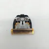 A close-up, top-down view of a hair clipper blade assembly. Anteprima dell’immagine prodotto