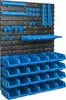A wall-mounted storage system with multiple shelves and bins. Anteprima dell’immagine prodotto