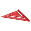 A red carpenter's square with measurement markings is shown against a white background. Náhled obrázku produktu