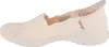Side view of a single white and beige Skechers slip-on shoe against a white background. Produktbild-Vorschau