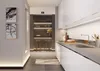 A modern kitchen with a breakfast bar and artwork on the wall. Anteprima dell’immagine prodotto