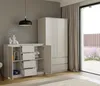 A modern living room with a white dresser and wardrobe, next to a large window overlooking a garden. Podgląd zdjęcia produktu