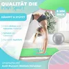 A woman performing a handstand on a yoga mat, with text overlays highlighting product features. Produktbild-Vorschau