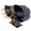 A black, four-bladed stove fan with orange arrows indicating airflow, set against a white background. Produktbild-Vorschau