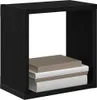 A black wooden cube shelf with three books stacked inside. Produktbild-Vorschau