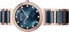 A close-up shot of a Bering Ceramic women's watch with a blue mother-of-pearl dial and rose gold accents. Náhľad obrázku produktu