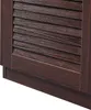 A close-up view of the bottom corner of a dark brown wooden cabinet with louvered doors. Náhľad obrázku produktu