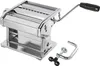 A shiny metal pasta maker with a black handle, resting on a white surface. A separate clamp accessory is visible to the right. Anteprima dell’immagine prodotto
