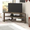 A corner TV stand with a TV and media devices in a living room setting. Podgląd zdjęcia produktu