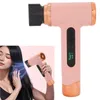 A collage showing a pink cordless hair dryer and a woman using it. Podgląd zdjęcia produktu
