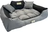 A dog bed with pillows, displayed against a white background. Voir les images du produit