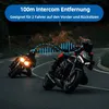 Two motorcyclists riding on a road at night, with a graphic overlay indicating communication. Anteprima dell’immagine prodotto