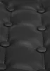 A close-up view of black tufted faux leather upholstery with buttons. Náhled obrázku produktu