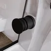 Detailbild eines mattschwarzen Griffs in einer Komplettdusche Produktbild-Vorschau