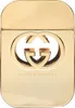 A close-up studio shot of a gold Gucci Guilty perfume bottle. Voir les images du produit