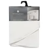 A white tablecloth folded and packaged with a cardboard header. Podgląd zdjęcia produktu
