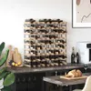 A wine rack filled with bottles, placed on a countertop next to a wall. Náhľad obrázku produktu
