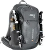 A gray hiking backpack with trekking poles and a water bottle attached. Anteprima dell’immagine prodotto